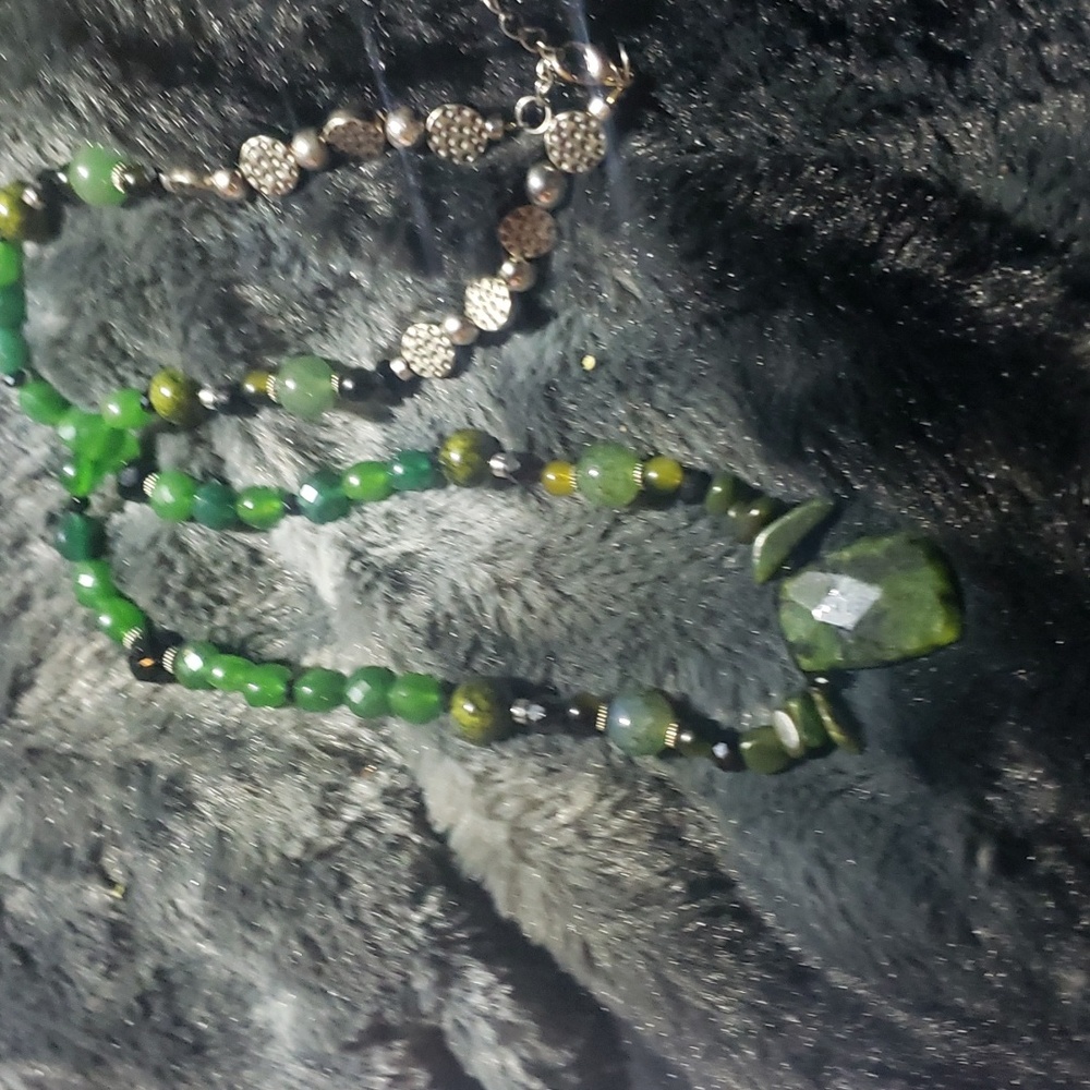 Nephrite stone pendent on semi precious stone and silver necklace